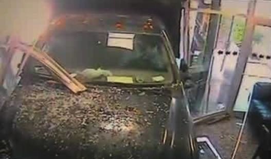 Stolen dump truck crashes into Channel 2's lobby just before noon Tuesday.